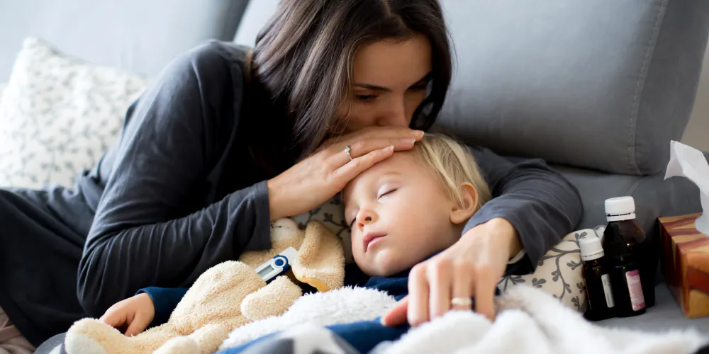 How can I tell whether my child has a cold or the flu?