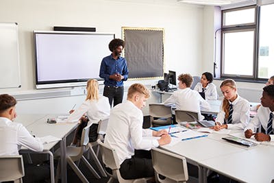 https://images.prismic.io/texthelp-website-proof/034a86e0-d8c7-4c1c-a96f-b9e102b6b112_Teacher-students-classroom-shutterstock_1188872692.jpg?auto=compress,format