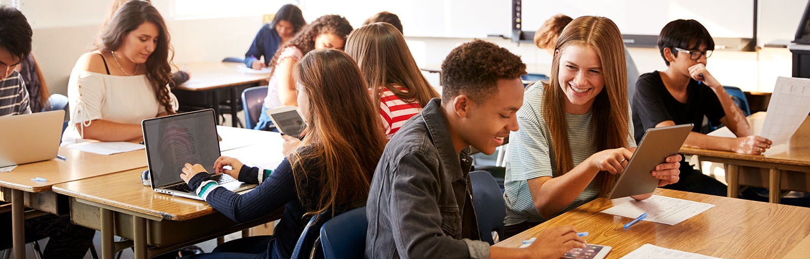 students in classroom with technology