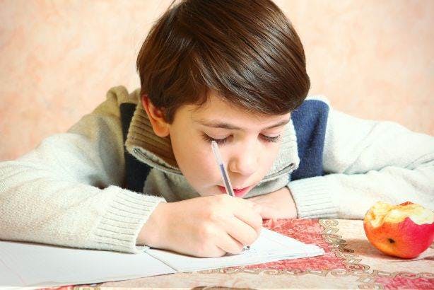 Boy writing