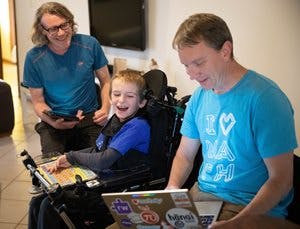 Student Cal with his dad and texthelper, John exploring EquatIO software