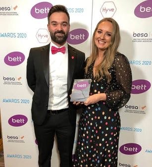 Texthelpers, Rick and Lynsey, holding the Bett Award for Read and Write