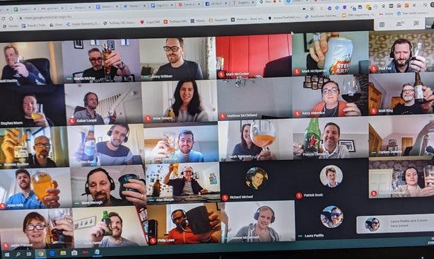 Google Meet grid view showing over 60 Texthelp employees on a virtual call