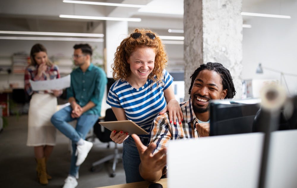 https://images.prismic.io/texthelp-website-proof/c1cea951-6b31-44f6-8326-07c20692f614_Happy+employees.jpg?auto=compress,format