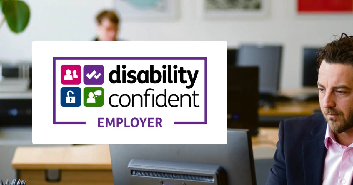 Disability Confident Employer logo and office backdrop