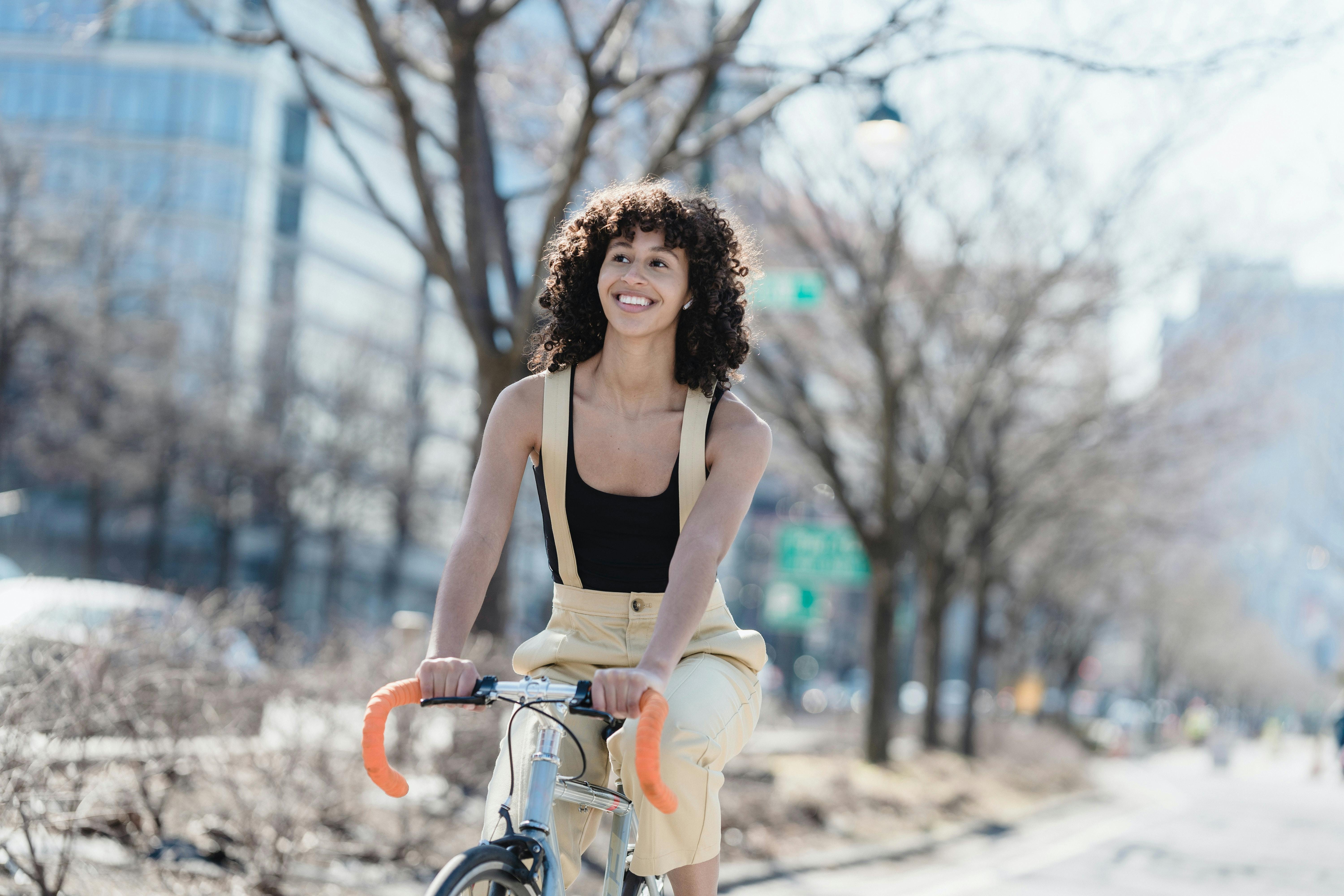 a girl riding a bike 