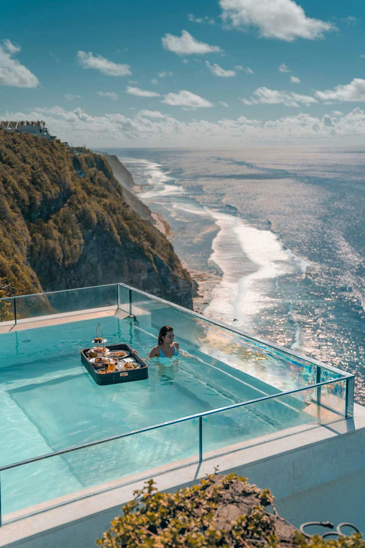 Luxurious 5-star hotel in Uluwatu, Bali with glass-bottom sky pool over the ocean