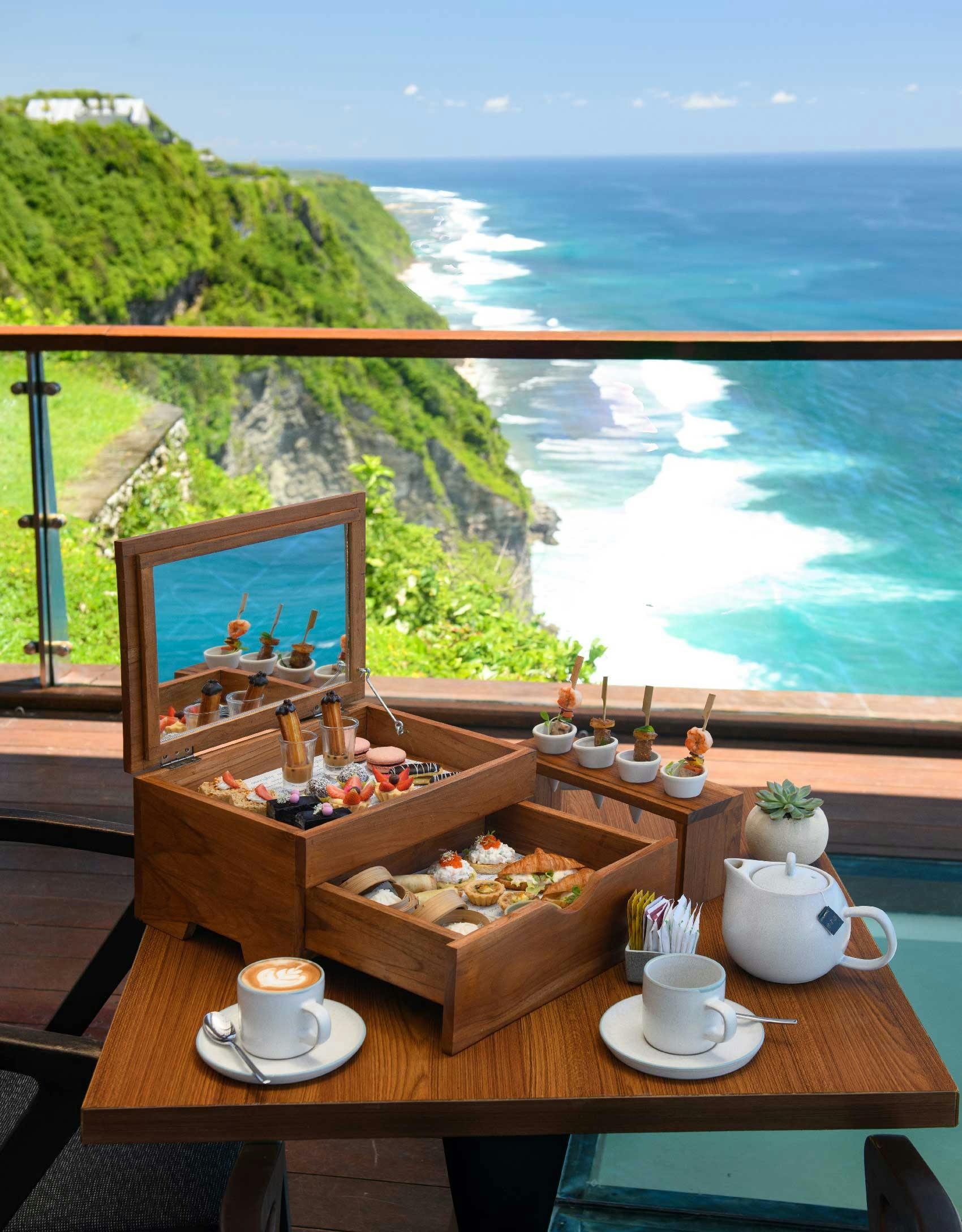 high tea experience by the edge of Uluwatu cliff, overlooking panoramic ocean views