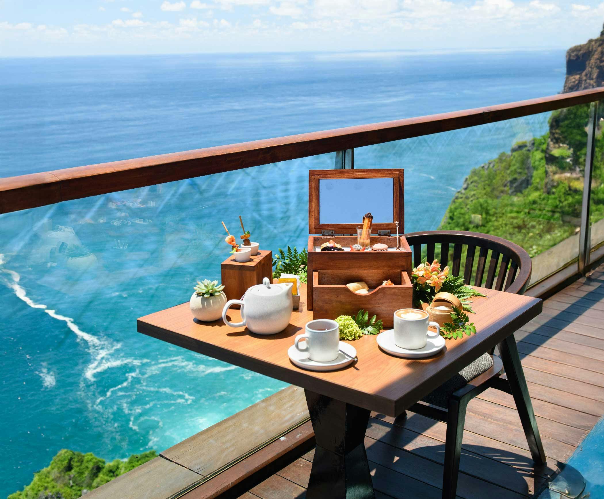 high tea experience by the edge of Uluwatu cliff, overlooking panoramic ocean views