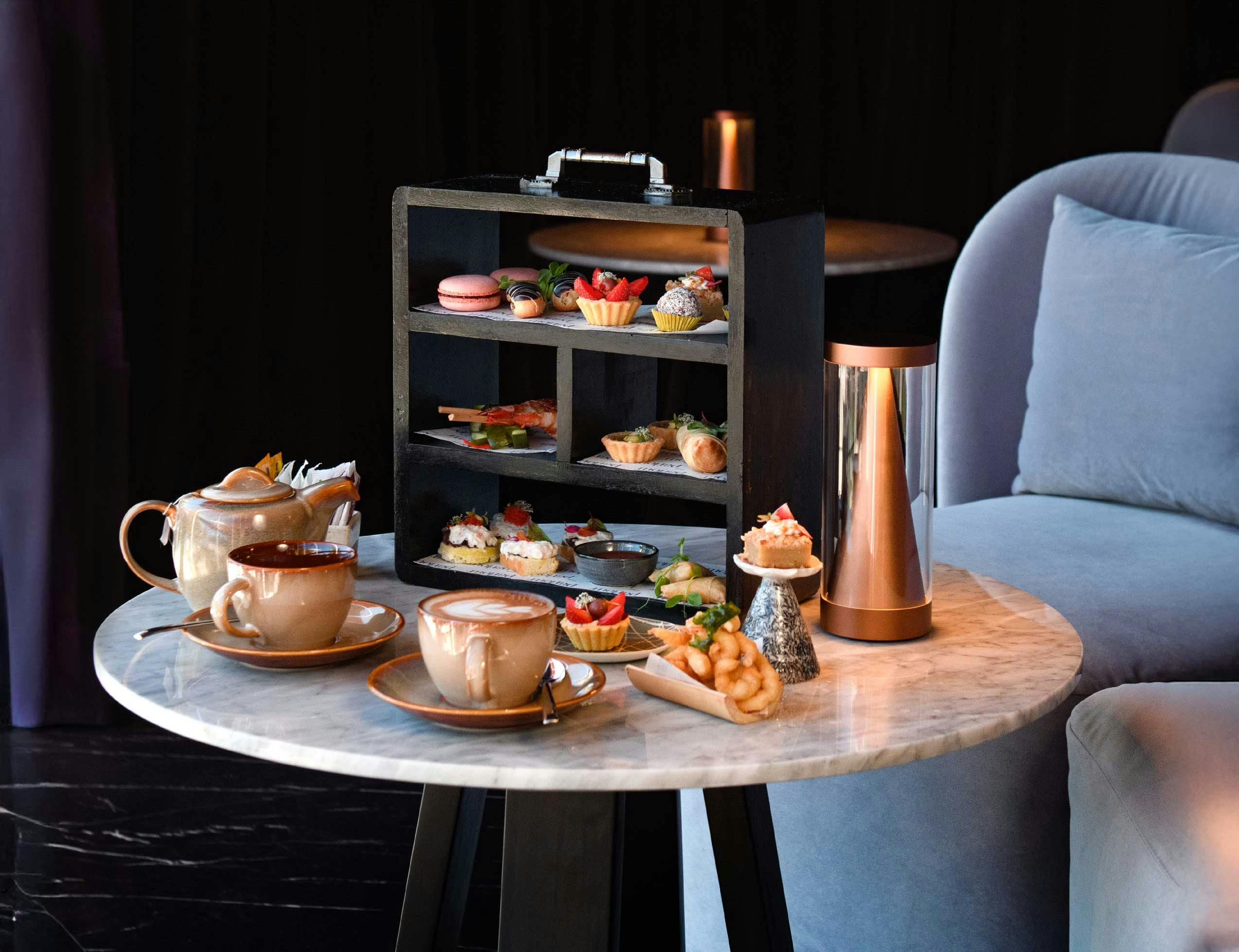 high tea experience at The parlour, overlooking our sky pool and Indian ocean views