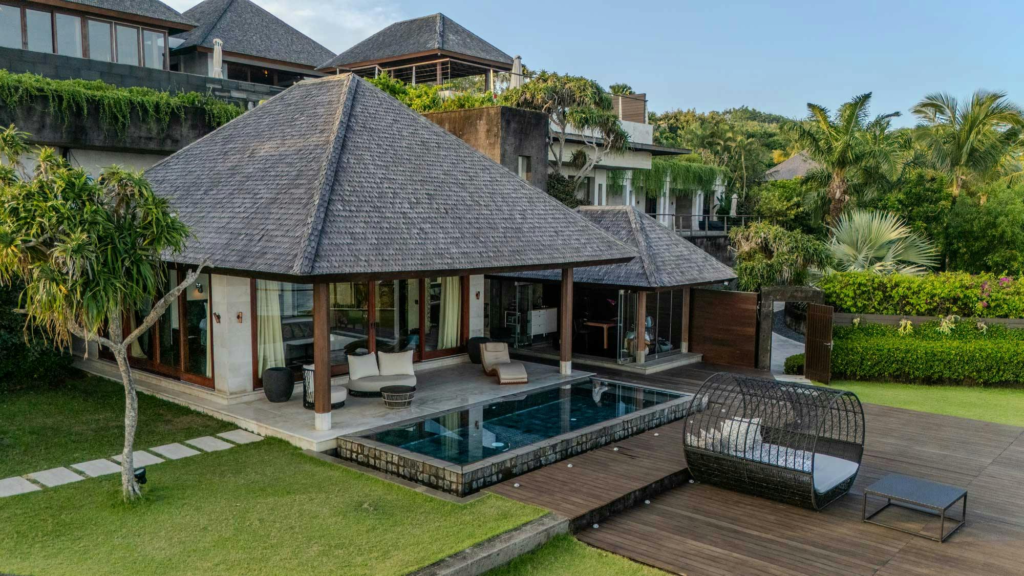 The outside view of a luxurious one-bedroom villa in southern Bali with breathtaking ocean views