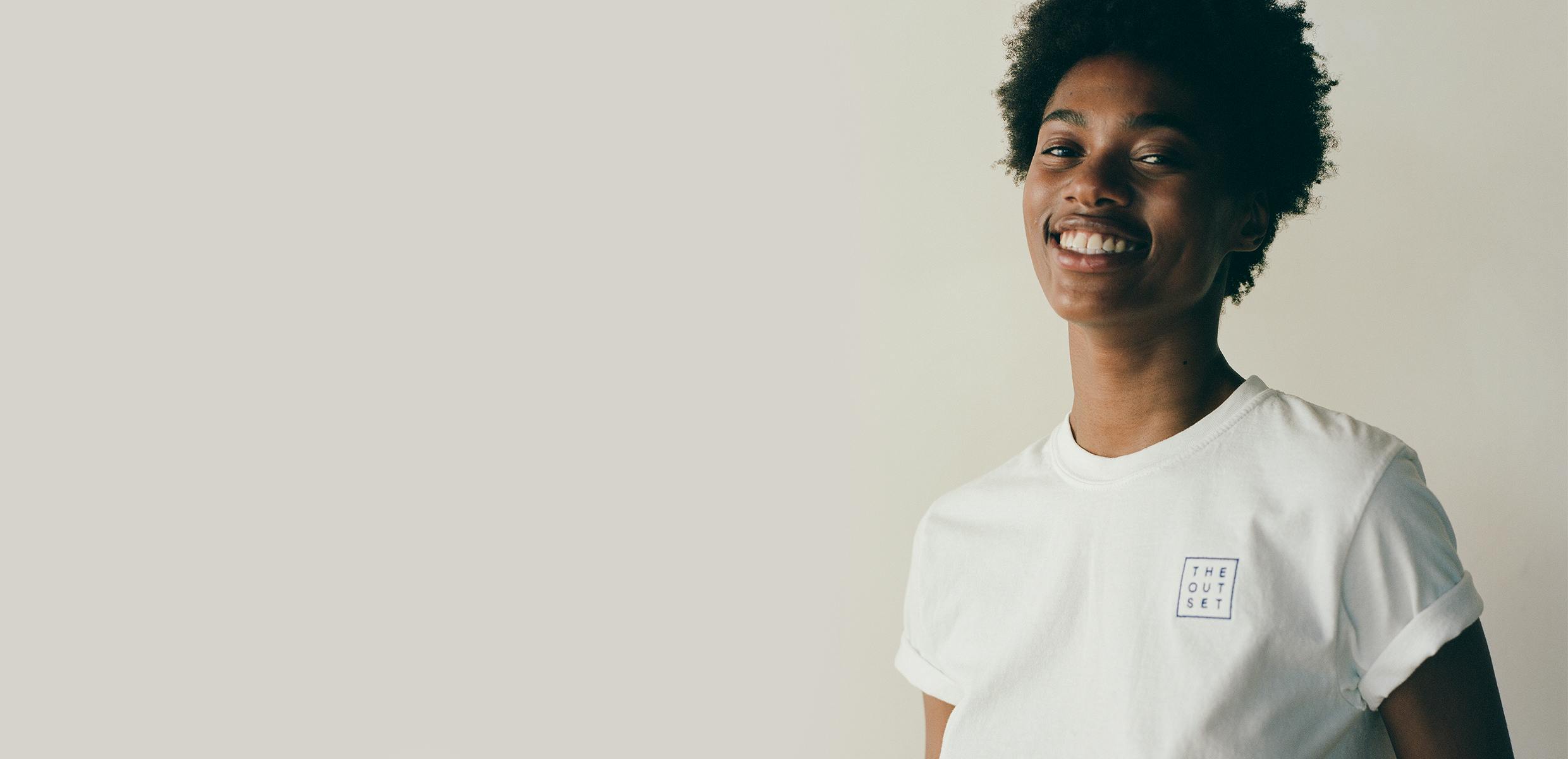 Photo of model wearing The Outset t-shirt
