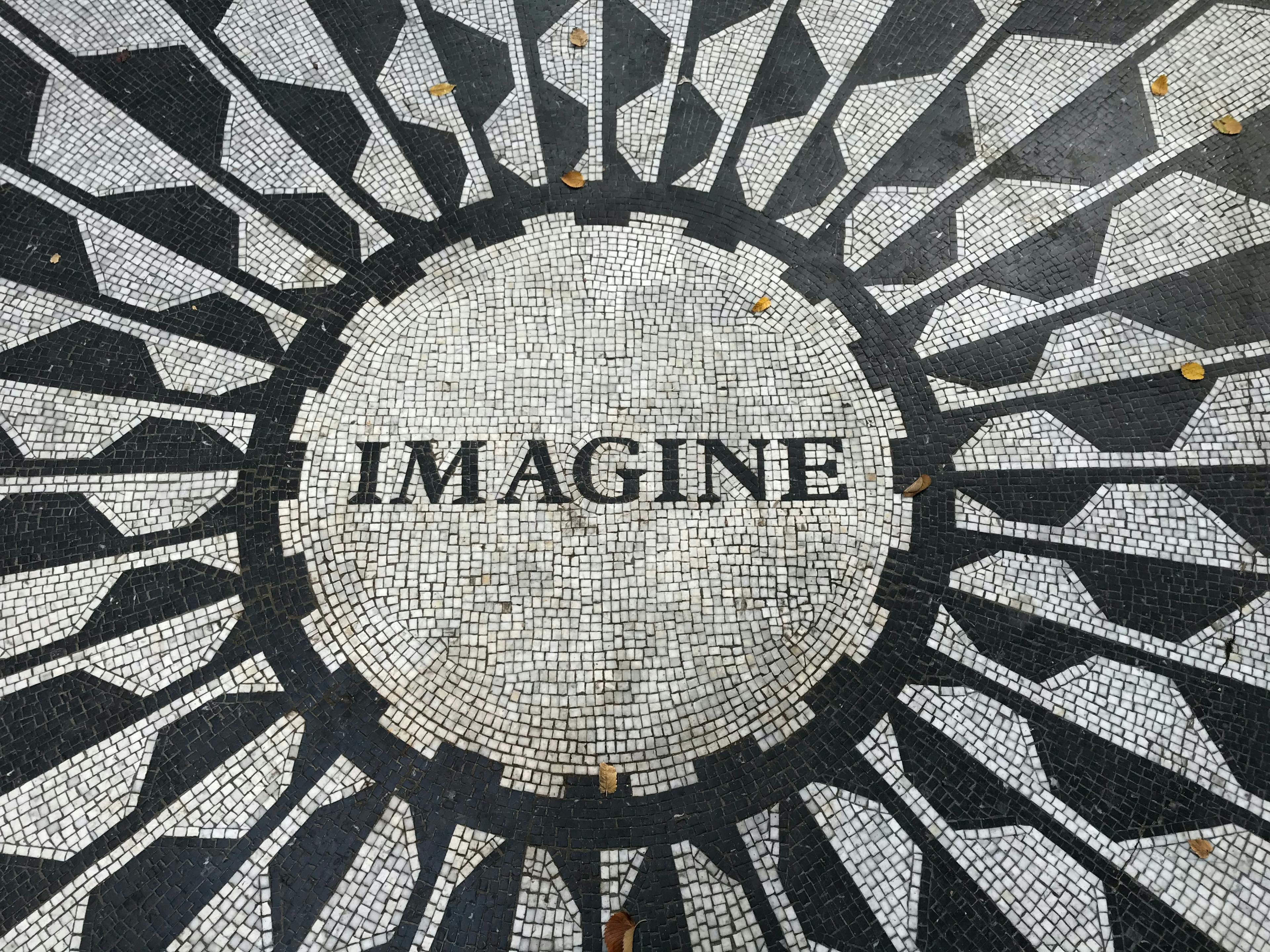 the text "imagine" on the ground within floor design