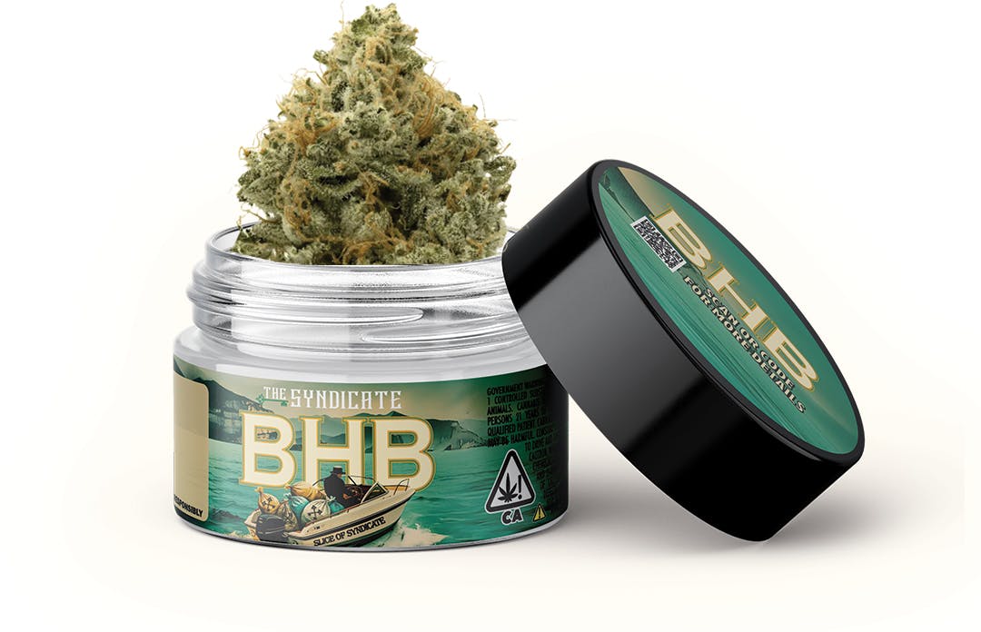 THE syndicate x dexter BHB flower strain in a jar with the nug sticking out