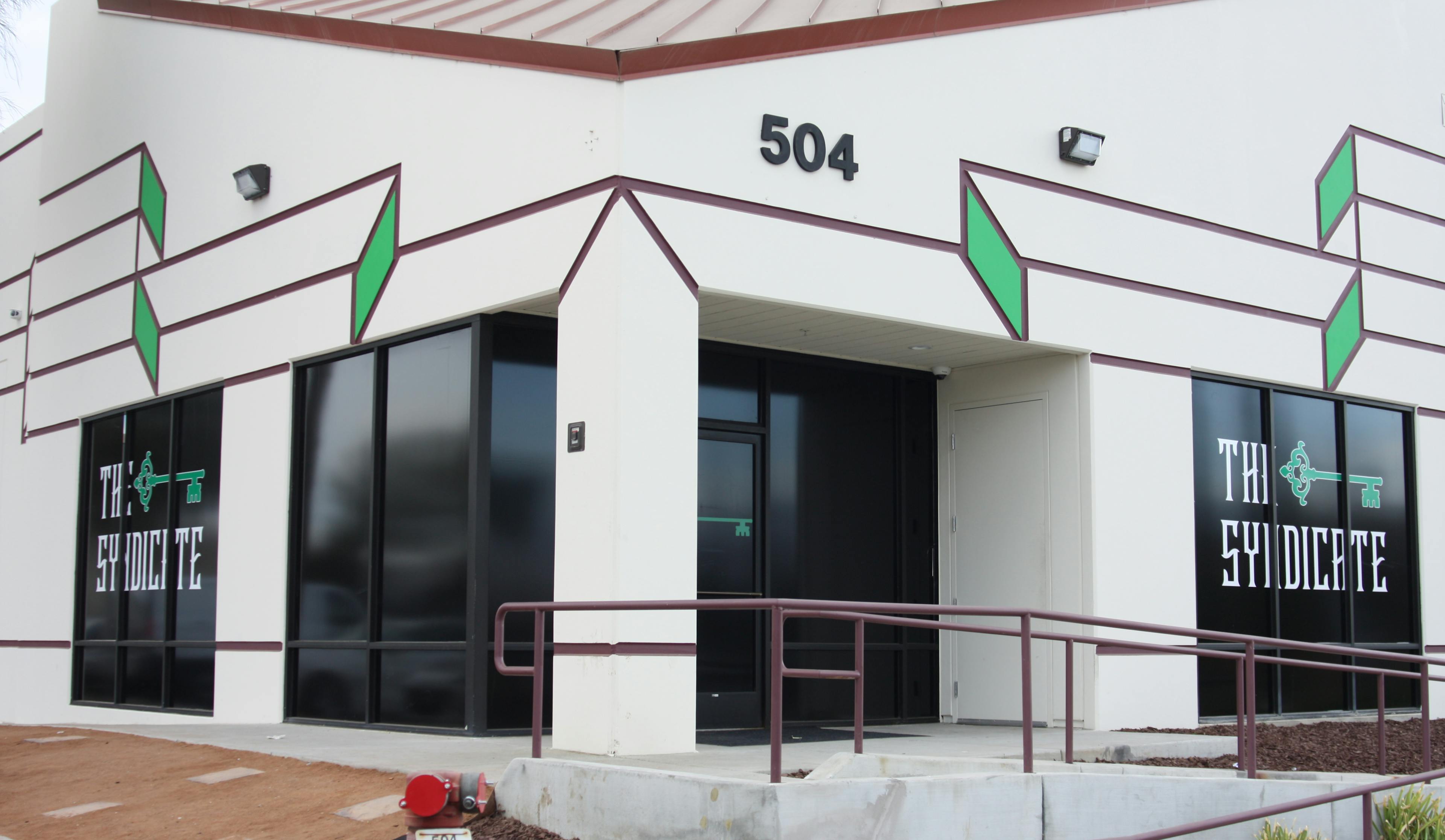 Corner view of The Syndicate Lake Elsinore 1 dispensary, showcasing architectural detail and ADA-friendly access