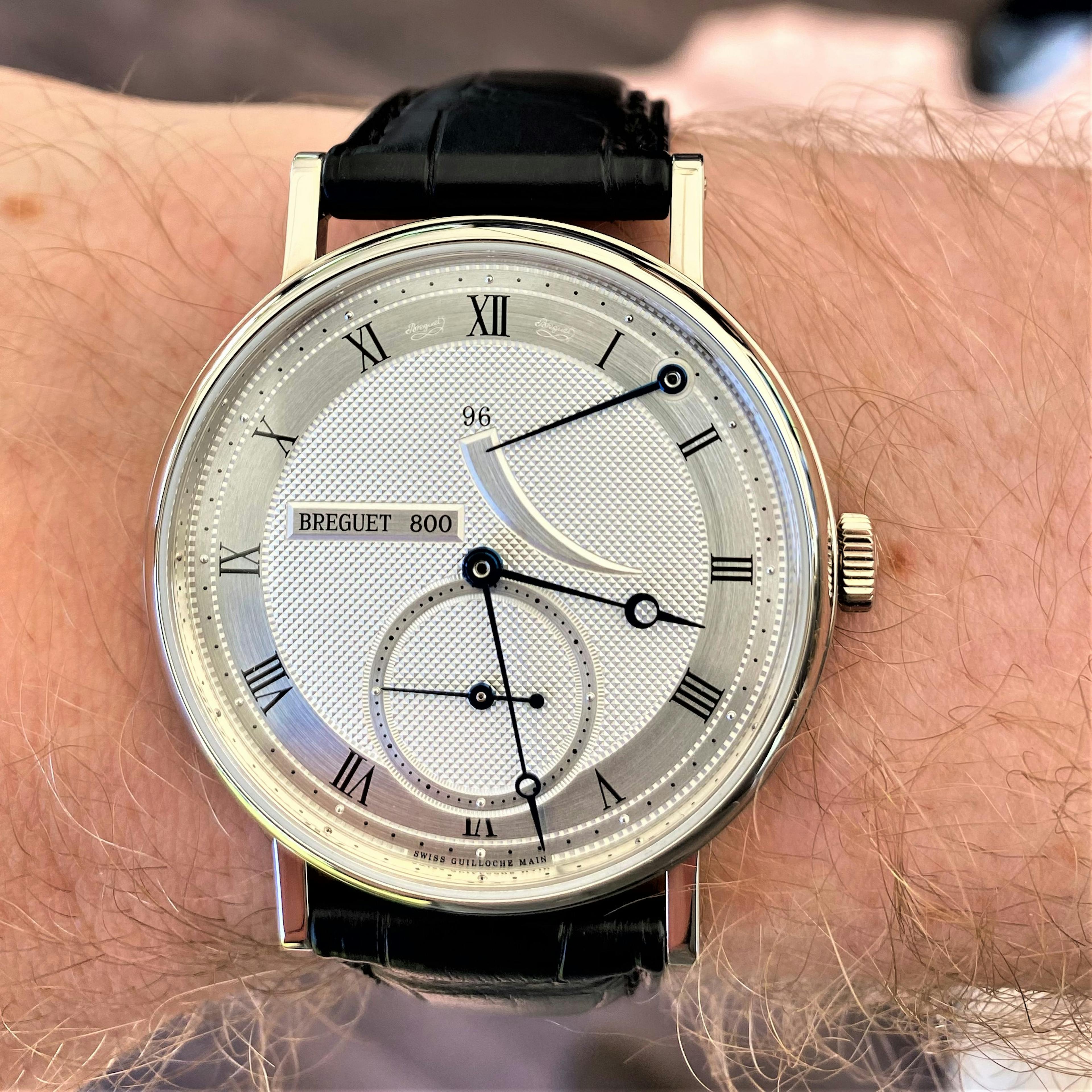 Modern Breguet Classique with Classic Breguet Minute and Hour hands with "Breguet Circle, and Power Reserve Function with sweep wedge to make it easy to read. Note also the Roman numerals on a separate finish of dial for easy reading.