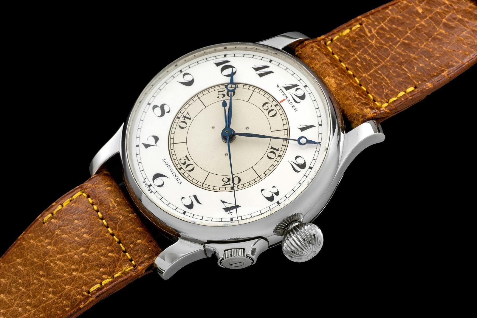 An original Weems designed centre seconds stopping watch from Wattnauer in the 1940s.