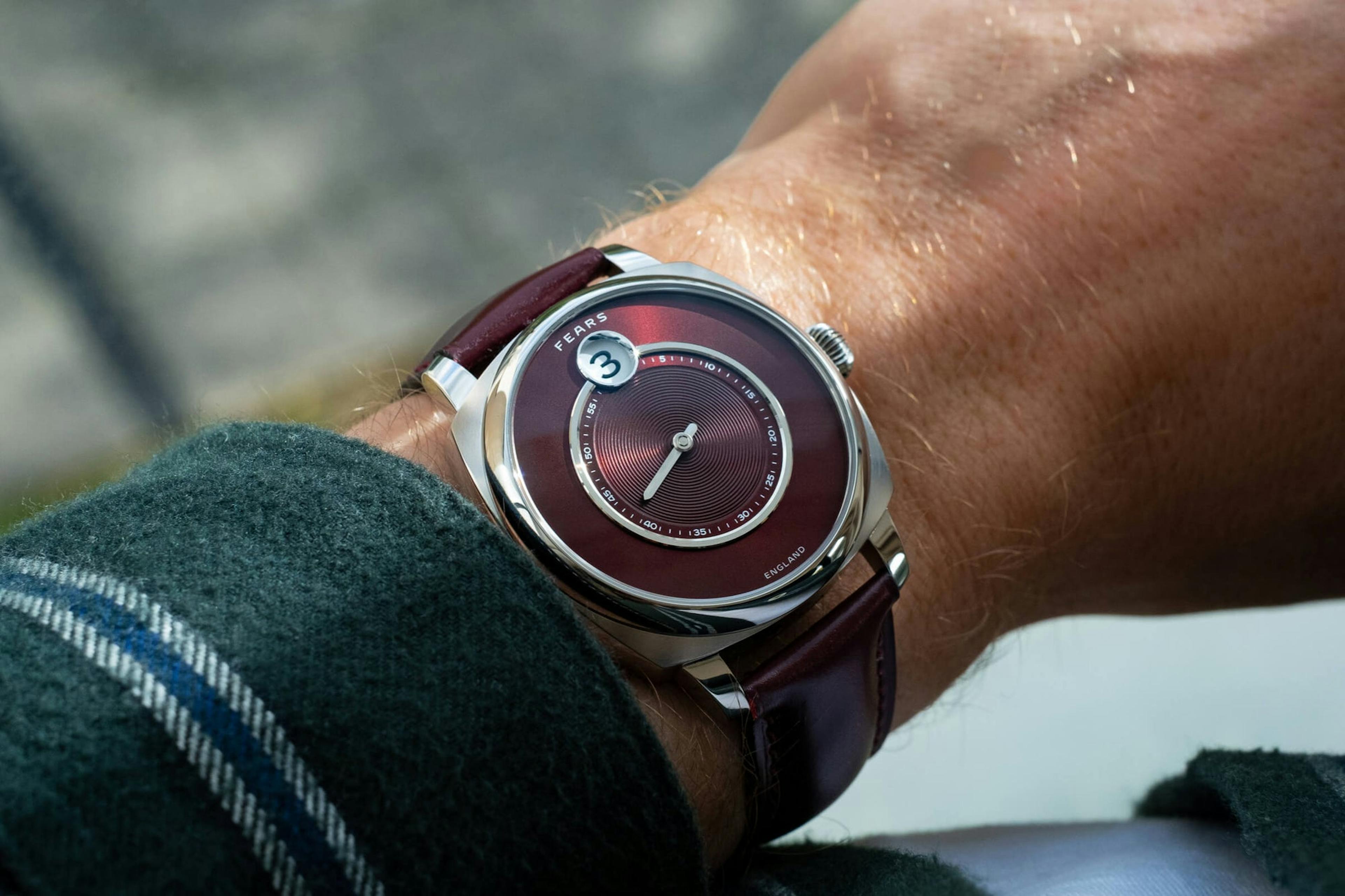 The Fears x Christopher Ward Alliance Wristwatch with the Jump Hour at the 12 O'Clock position. 