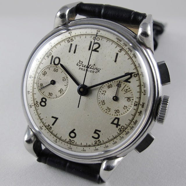 A Breitling Premier from the 1940s.  Breitling was one of the firms laid low in the 1970s, and the firm was wound down, with only the trademarks being sold to a surviving company, from which the brand was resurrected in the early 1980s. This is despite Breitling being a huge global brand right through the 1960s and introducing some of the most iconic watches of the 20th Century.
