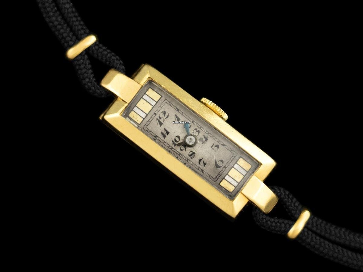 Rolex Prince Ladies watch in the Art Deco Style. Note the tiny dial and hands and strap style bracelet that could be changed for any other material. Even though this watch is from 1920, it reflects the style of ladies watch dominant for decades before.