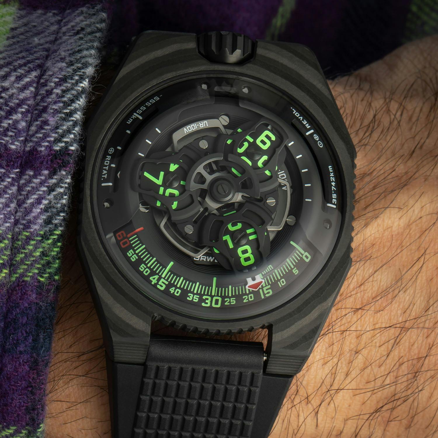 Urwerk Carbon Fibre Space Traveler. Very unusual mechanism, time display and a Carbon Fibre case. Image courtesy: monochrome-watches.com