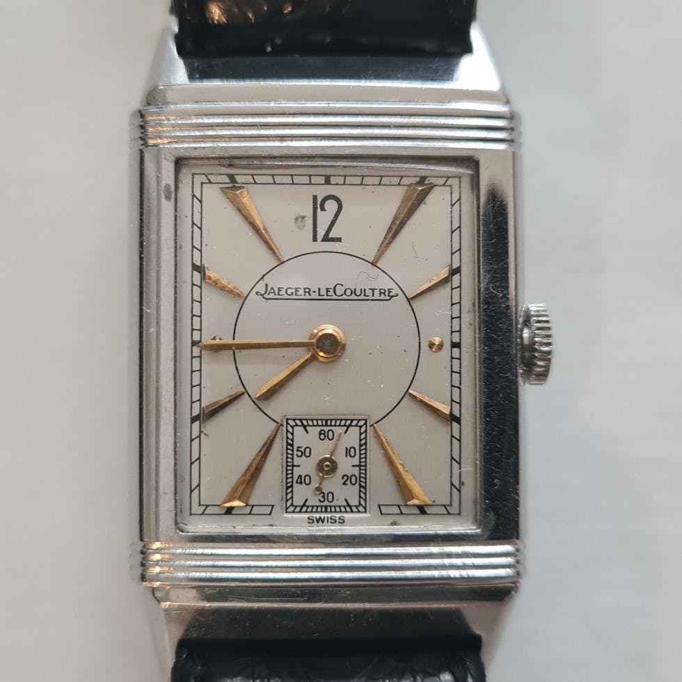 Men's Art Deco Style Reverso watch with gold hands and indices from 1946
