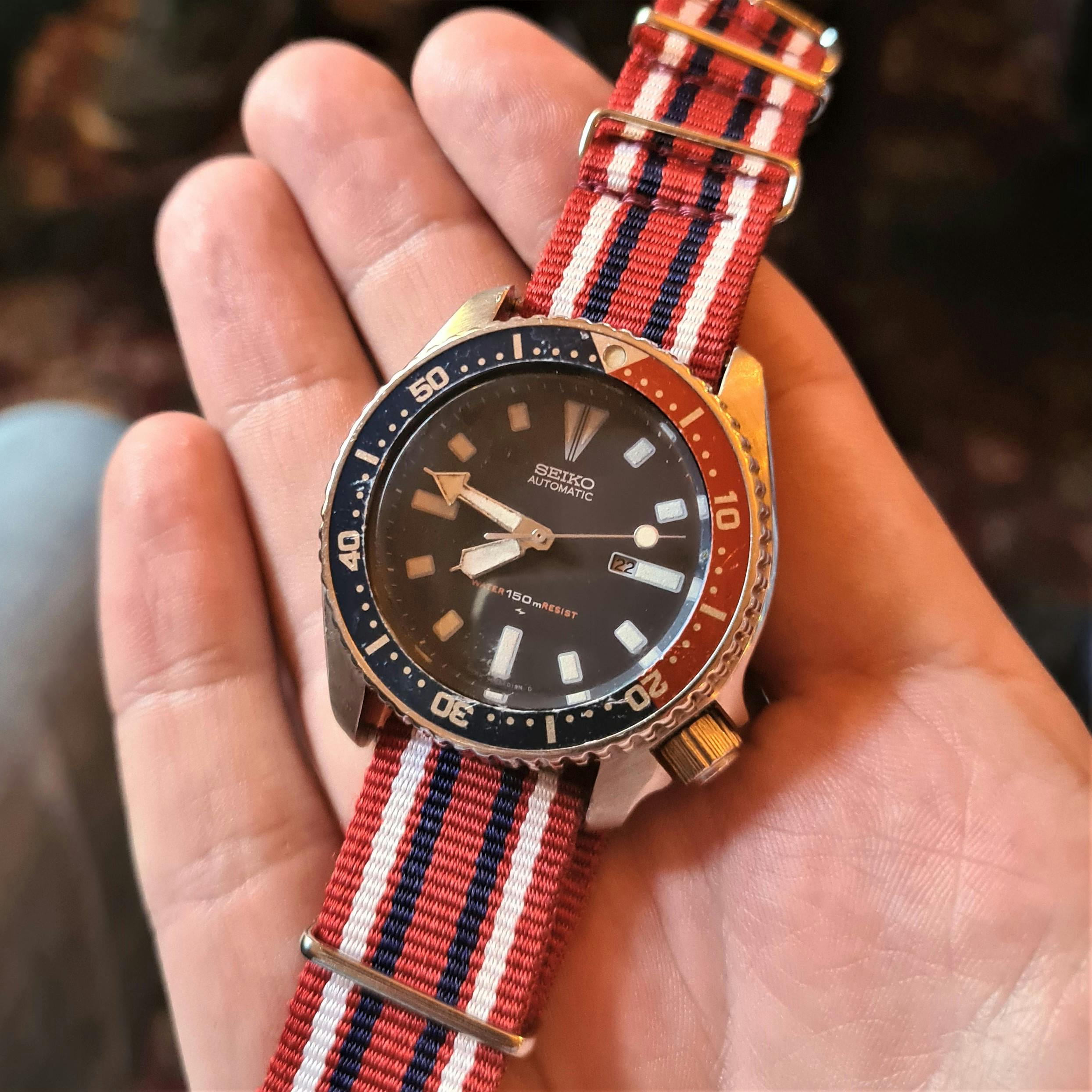 Colourful nato strap on a Seiko diving watch