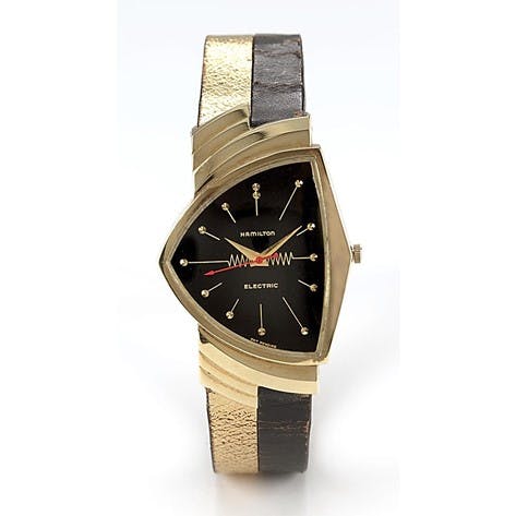 A Vintage Gold and Black Hamilton Ventura, the world's first electric wristwatch. This watch was NOT powered by a quartz movement.