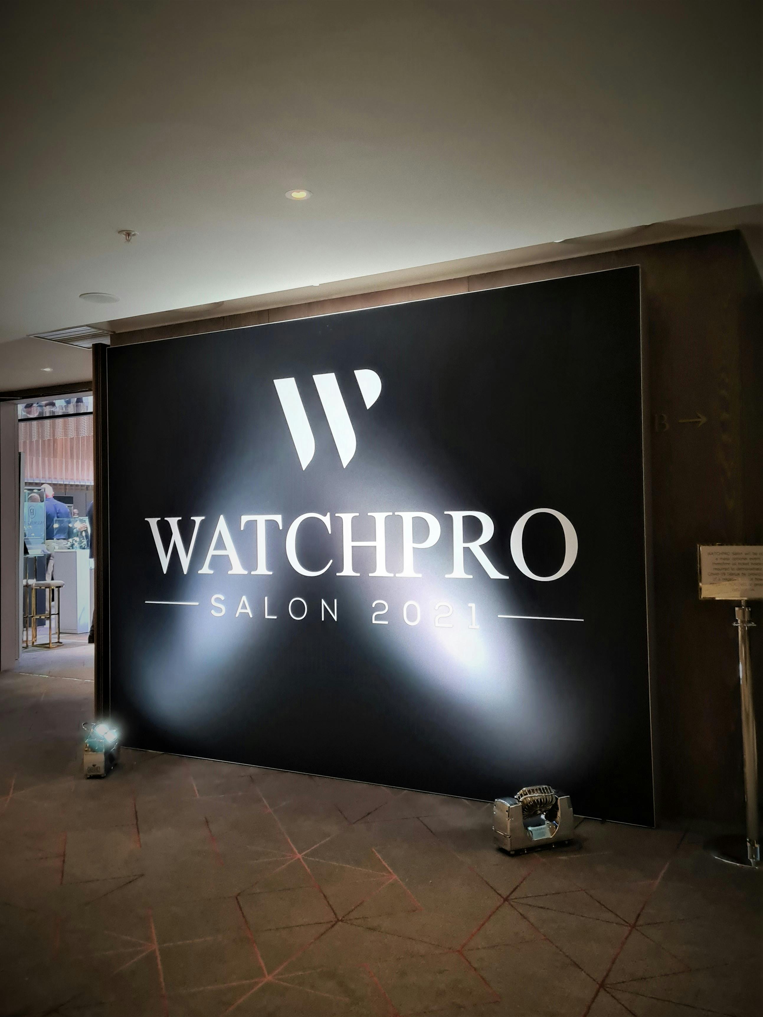 Large black and white banner from WatchPro Salon 2021