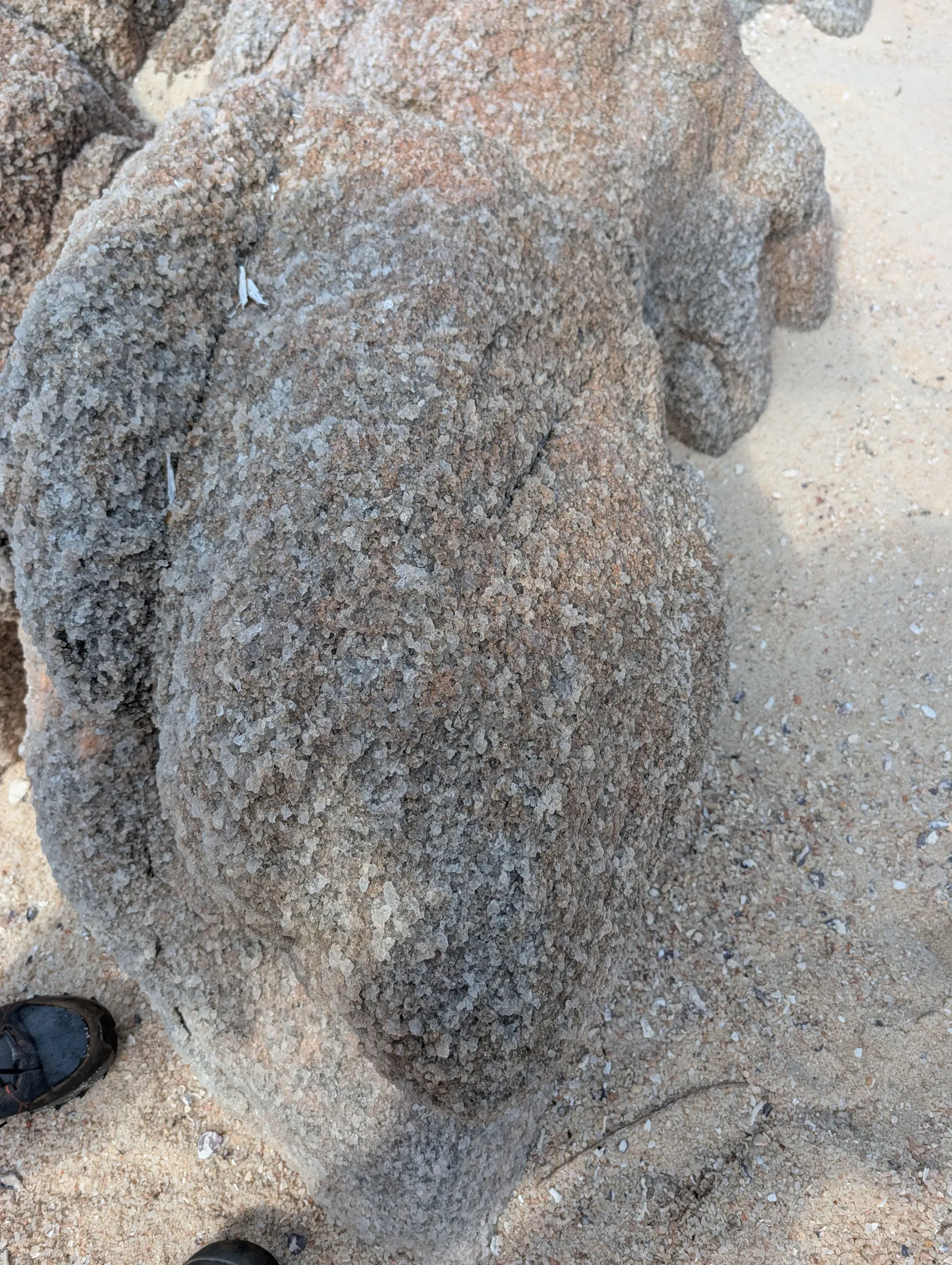 A close up of a quartz boulder, the erosion of which creates a beach of quartz crystals which were gorgeous but tough under foot!