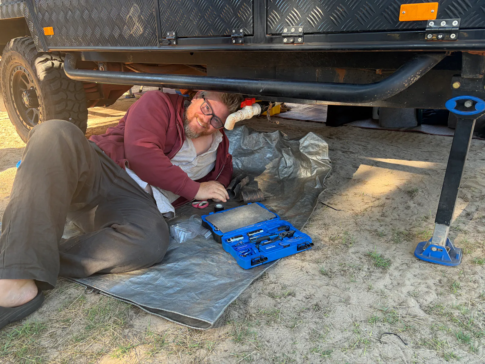 He did get some help from some older blokes in neighbouring vans, who of course loved the opportunity to show off their own handyman skills... but check him out getting down and dirty with a toolkit!