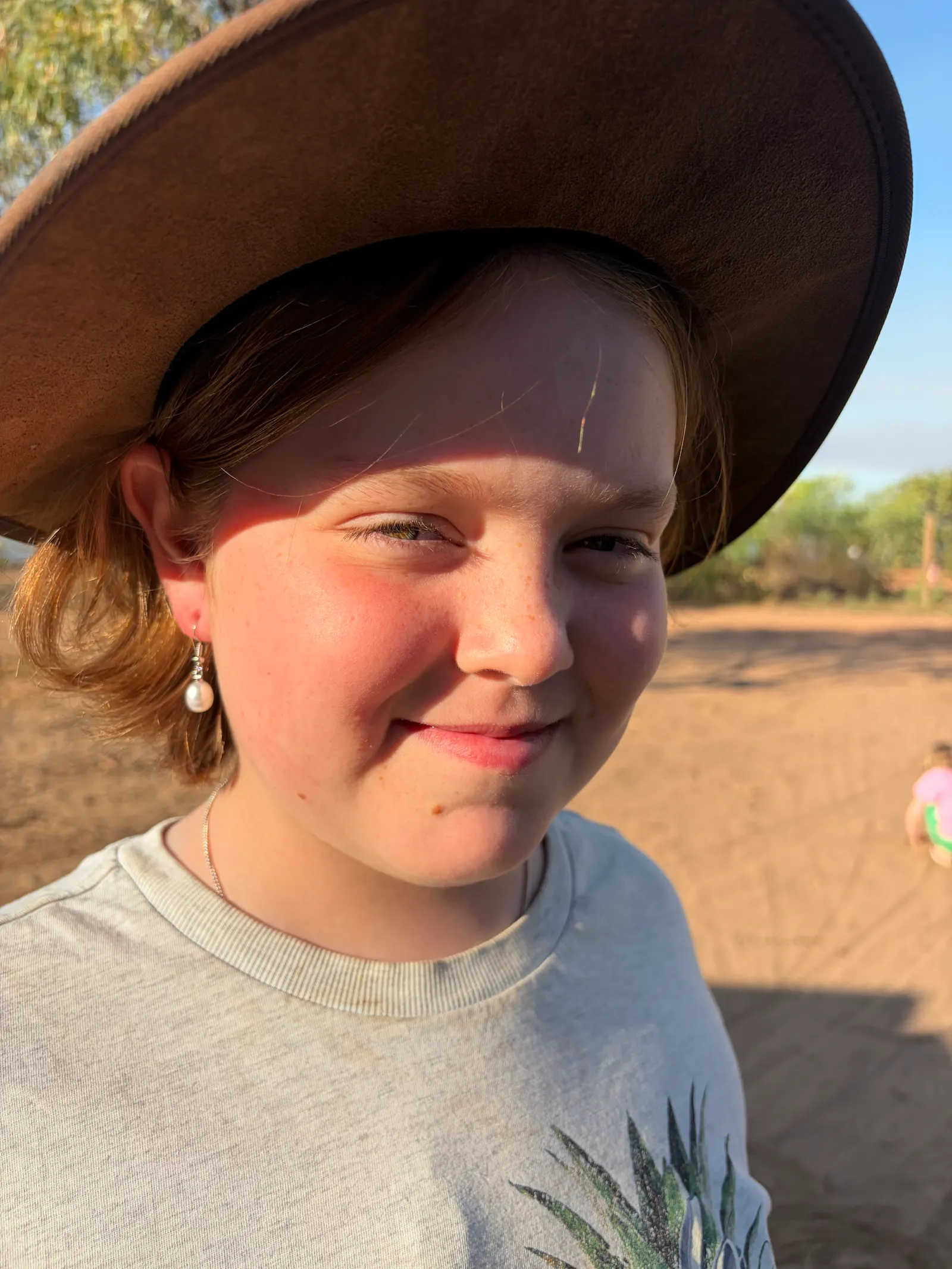 After her piercings had FINALLY healed, Nora was very excited to try on the pearl earring that we were given at the end of the camel ride.