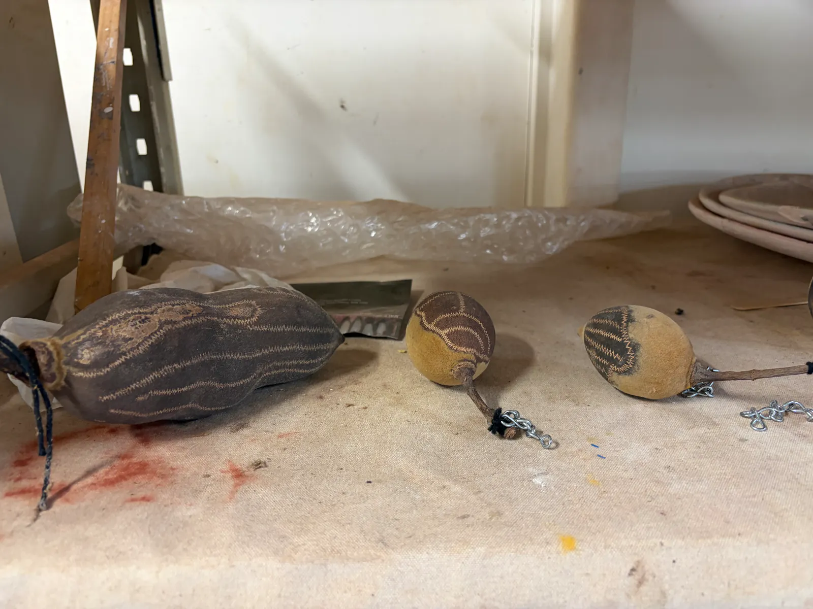 Some carved boab nuts, that are both art works in themselves as well as inspiration for the beautiful coloured porcelain versions.