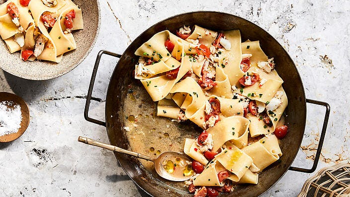 A photo of pappardelle with tomatoes, crabmeat, and chives (image by Sharyn Cairns)