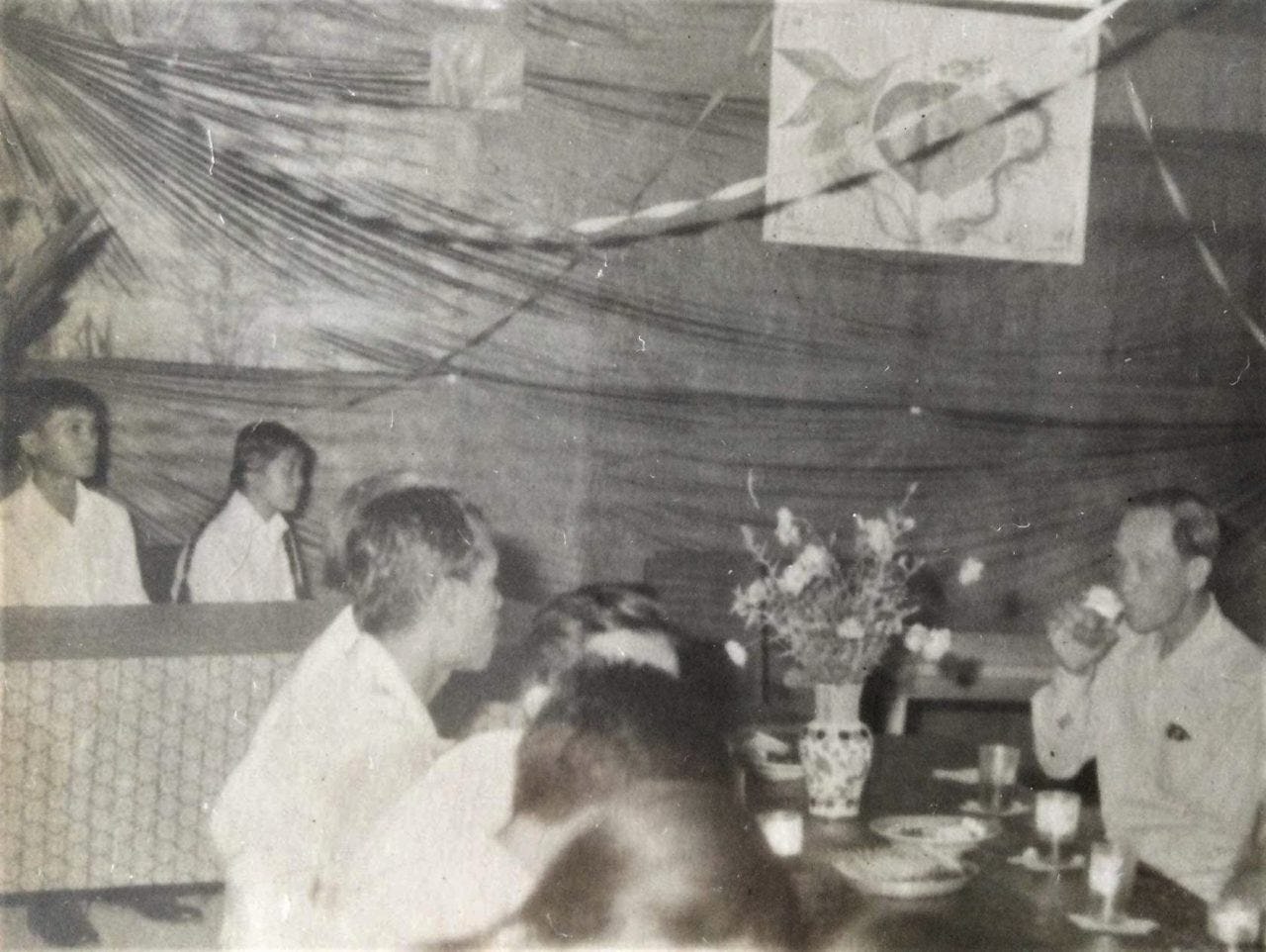  A photo of the author’s parents at their wedding. They met, fell in love and got married during their time in the Vietnamese Communist army. (Parents, left-hand side; grandfather, right-hand side).