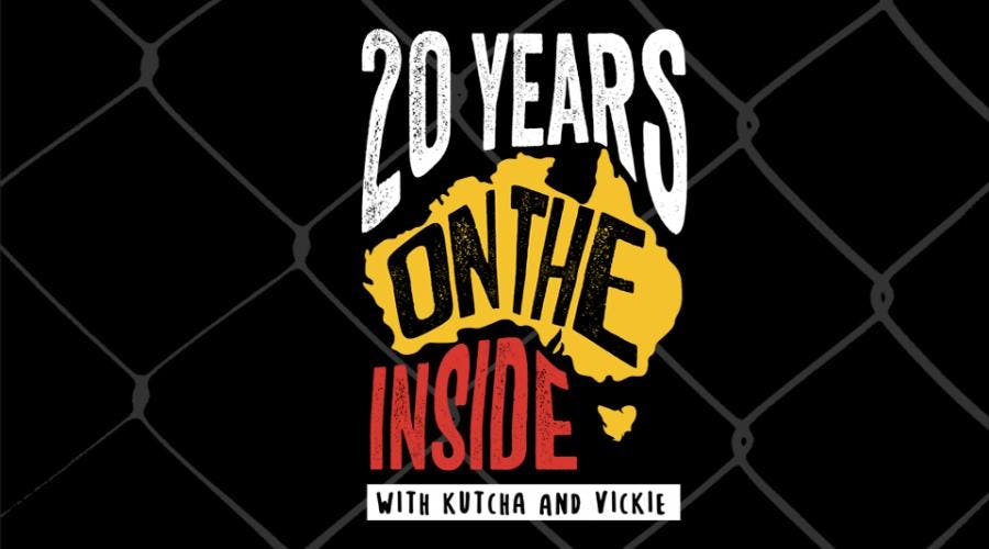 Image of the white, yellow and red text, ‘20 Years on the Inside with Kutcha and Vickie’, against a wire fence and black background. 