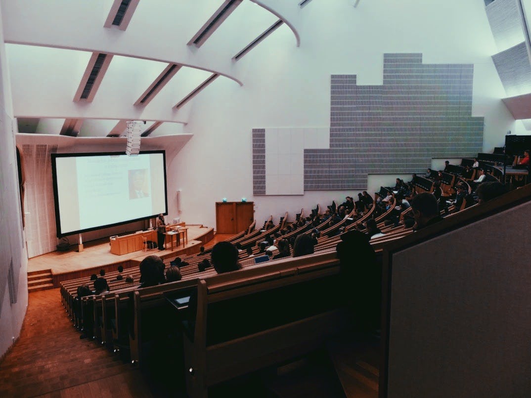 Photo of a university lecture theatre. Image: Dom Fou, Unsplash.