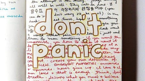 Handwritten inspirational phrases cover a page from Emma Brown's notebook. In the center, the phrase "don't panic" stands out in bold letters.