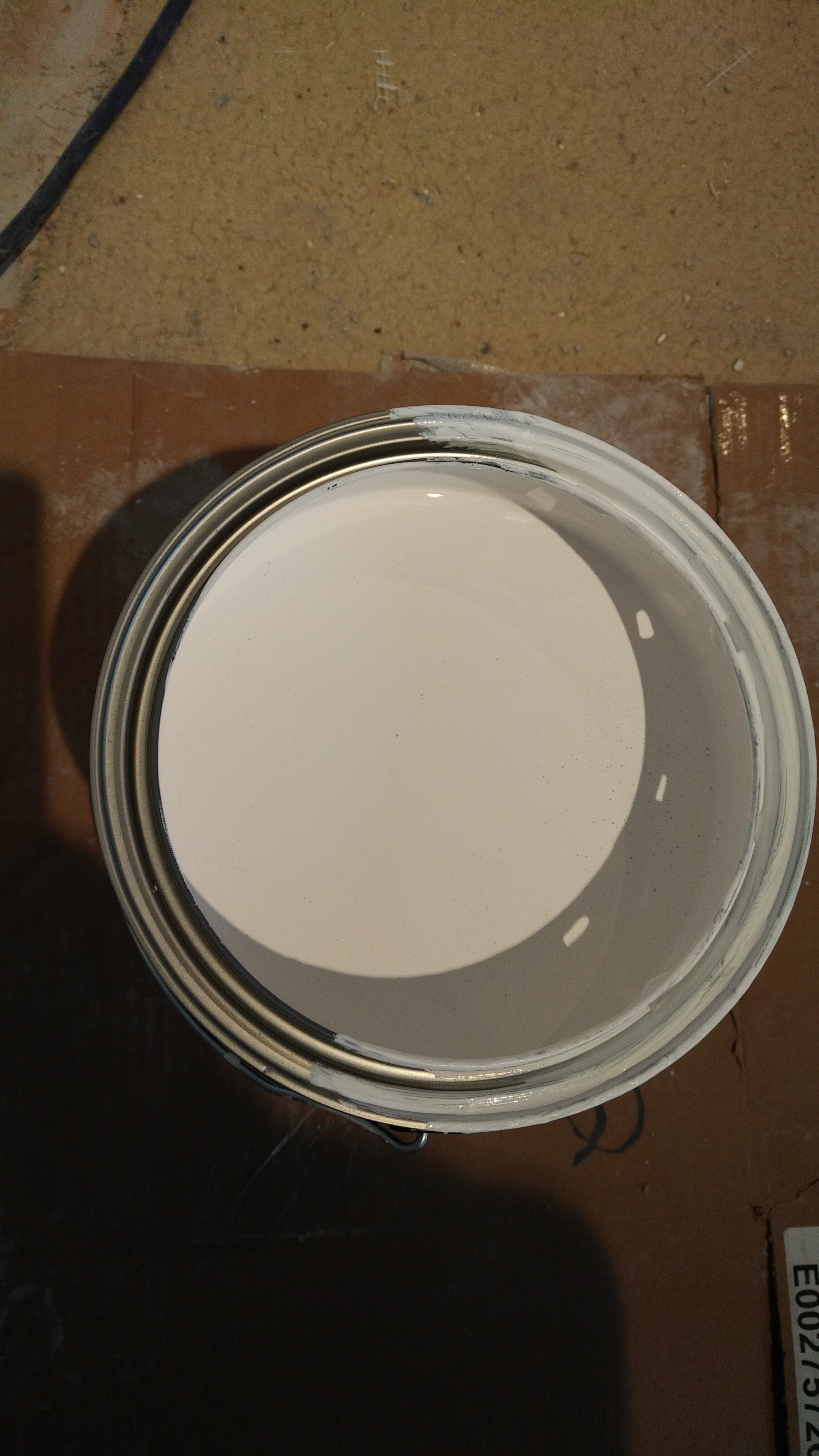 Clean paint can with drip holes