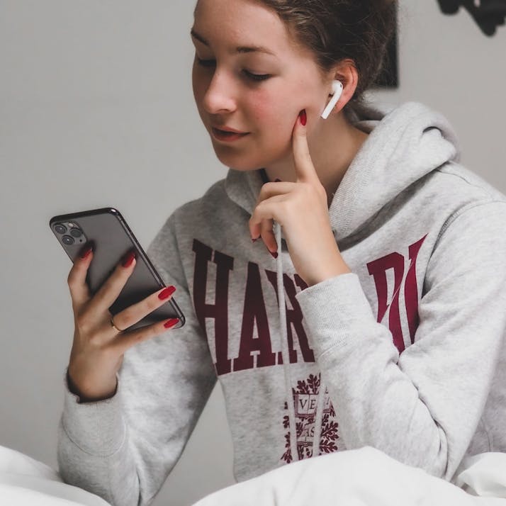 A college student on her phone