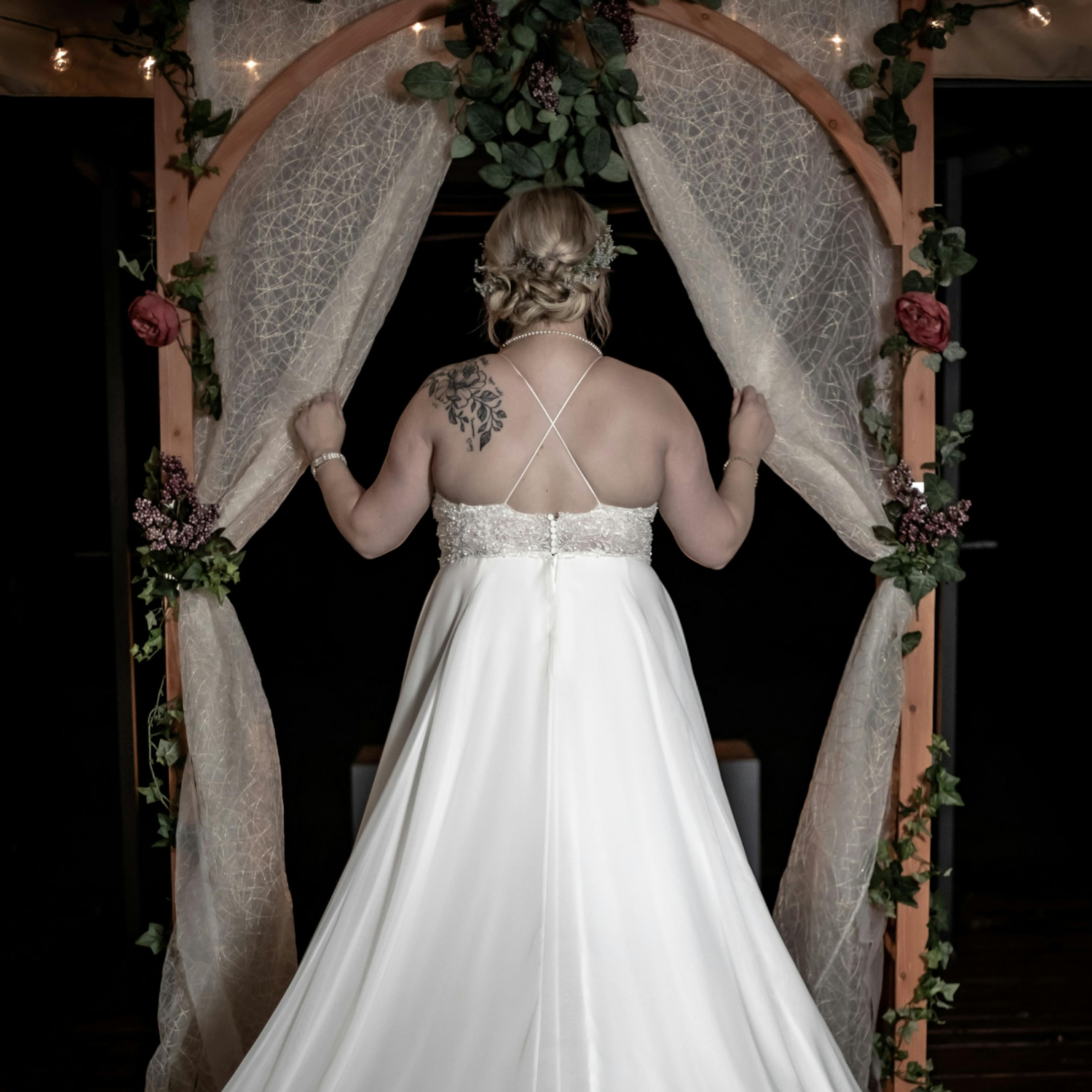A bride realizes that the day is about her, and that she is perfect, back rolls and all.