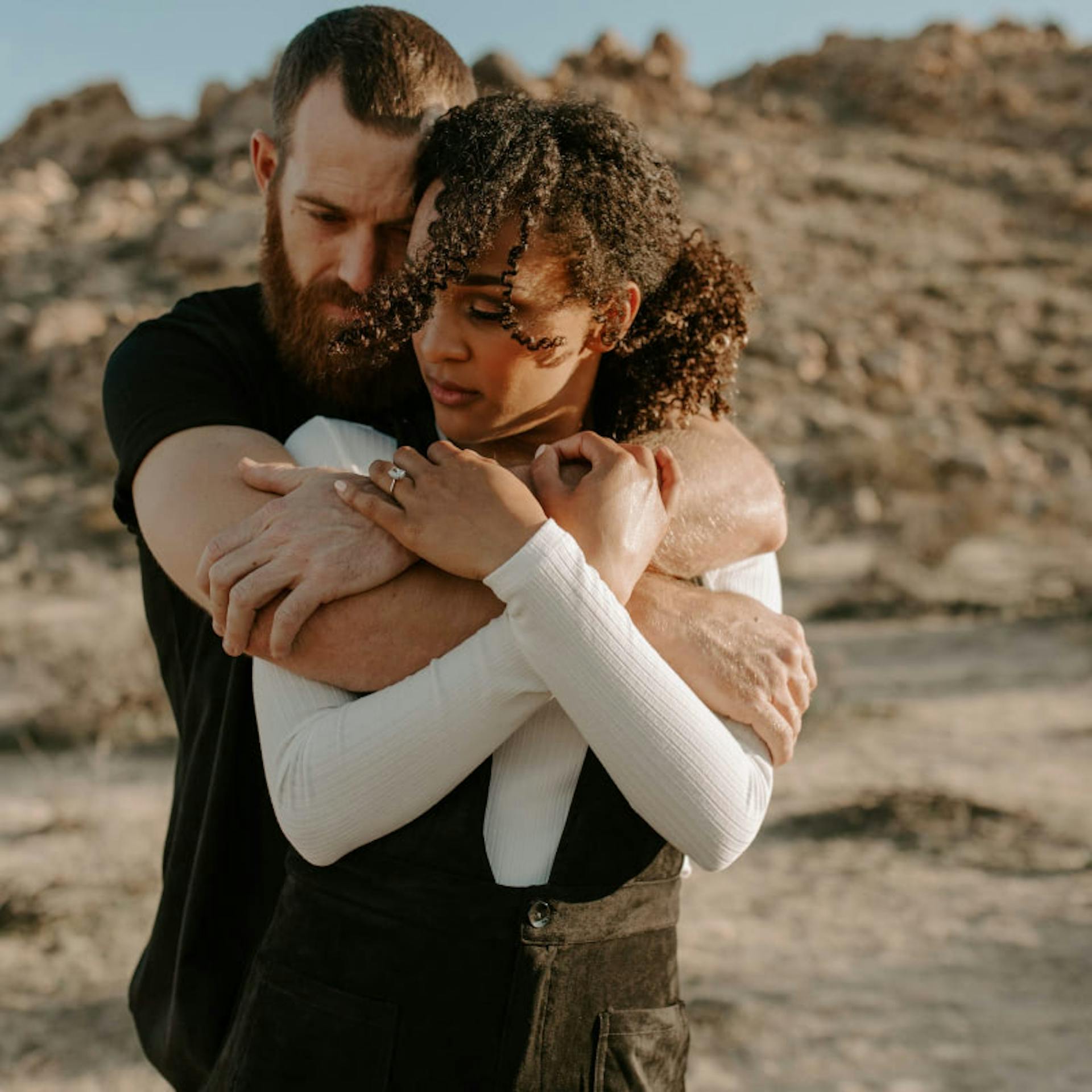 Despite the challenges of traveling together, a couple is still dedicated to each other.