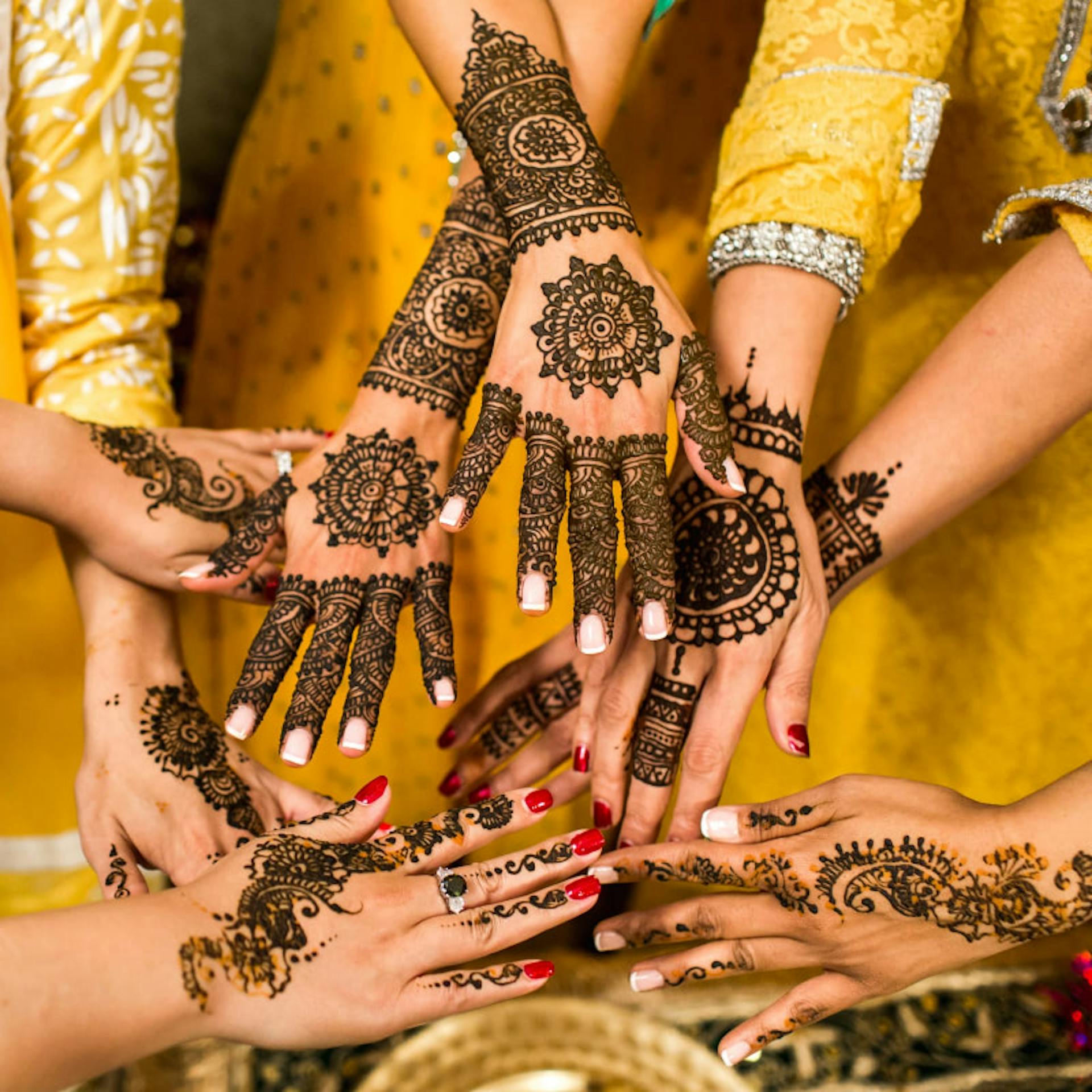 The traditional Mehndi ceremony is just one of many that make up a Desi wedding.
