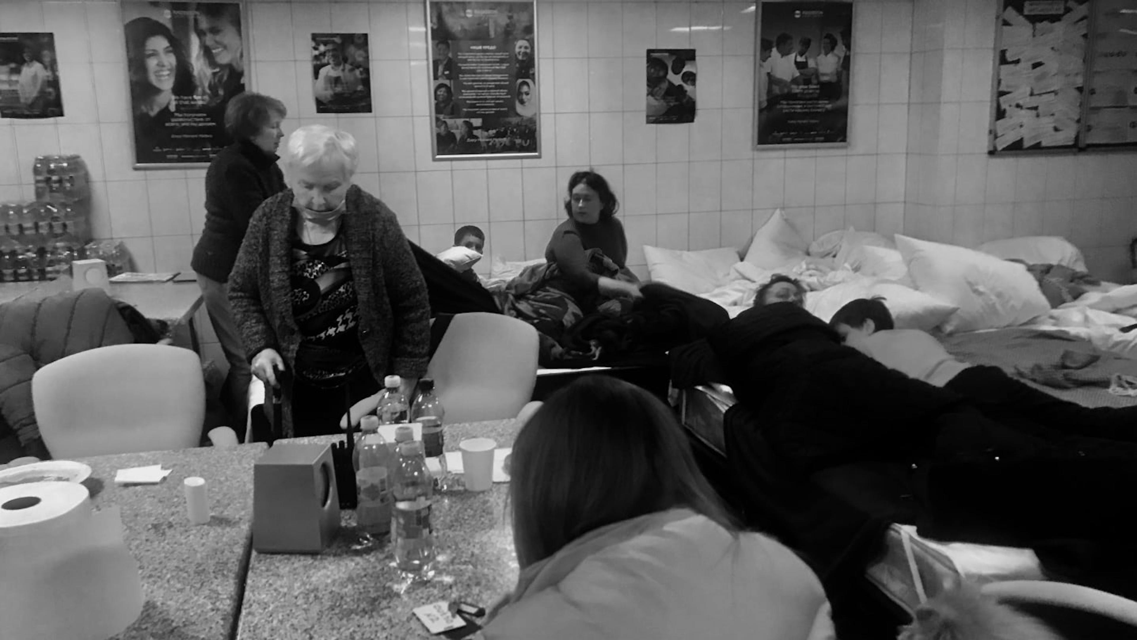 Hotel guests taking shelter in a hotel basement in Kyiv.
