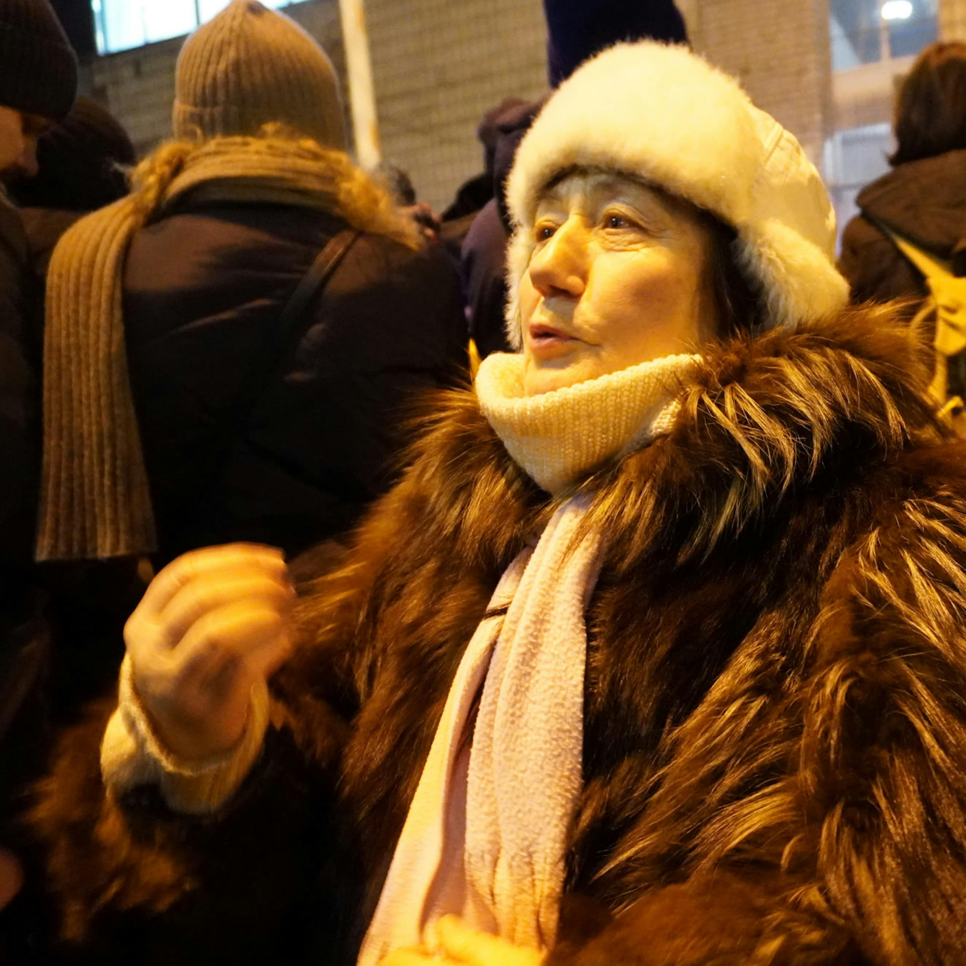 An elderly Ukrainian protester talking to a journalist.