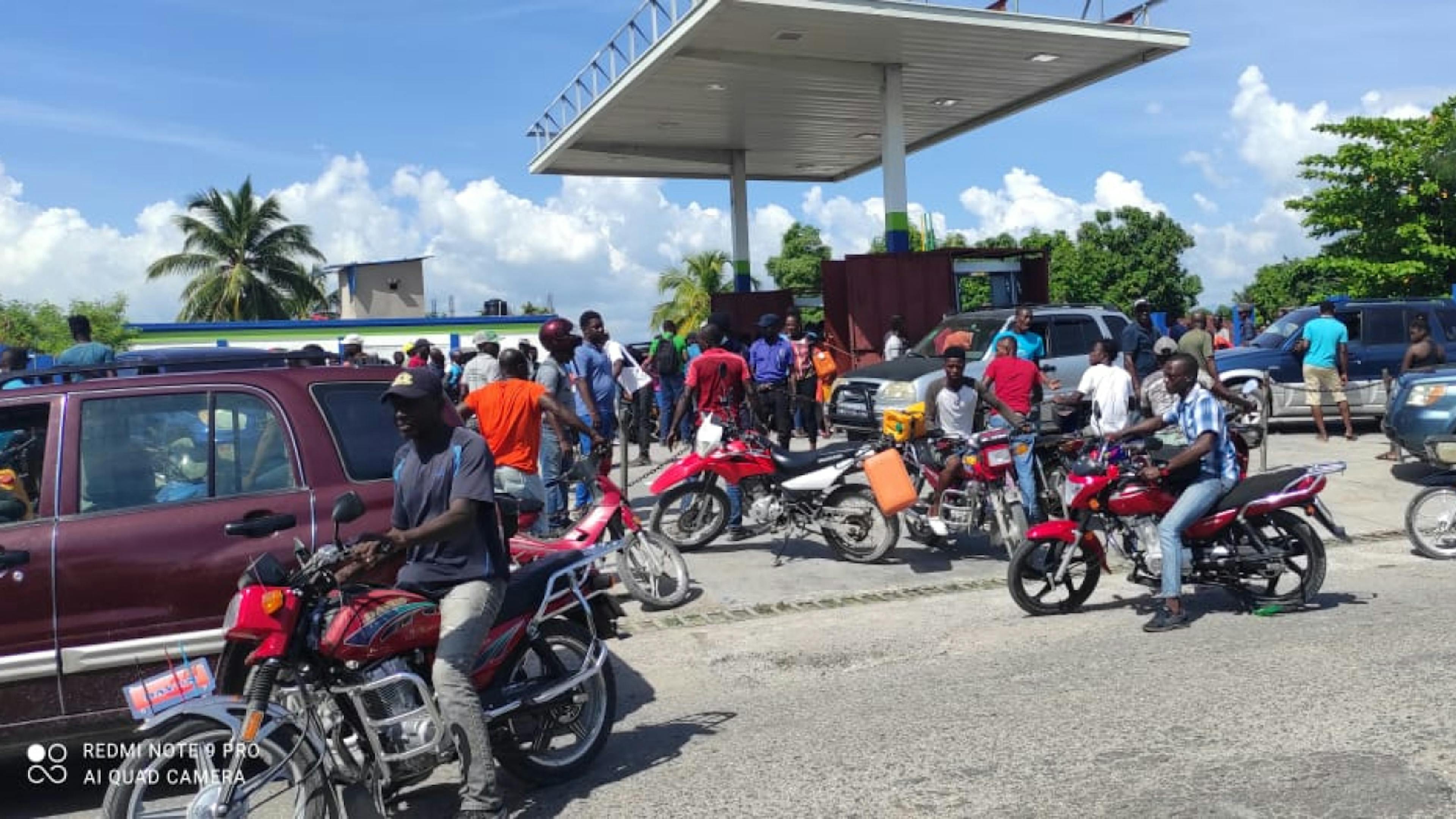 People in Haiti wait for days at gas stations due to shortages caused by gang activity.