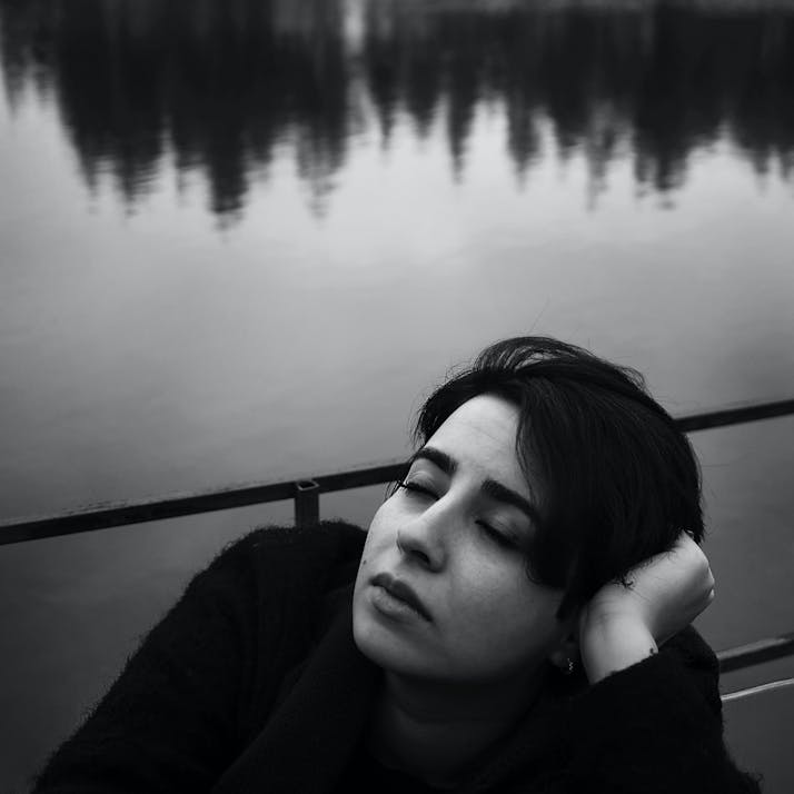 Woman with eyes closed