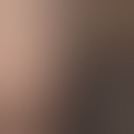 Girl on bed exhaling smoke