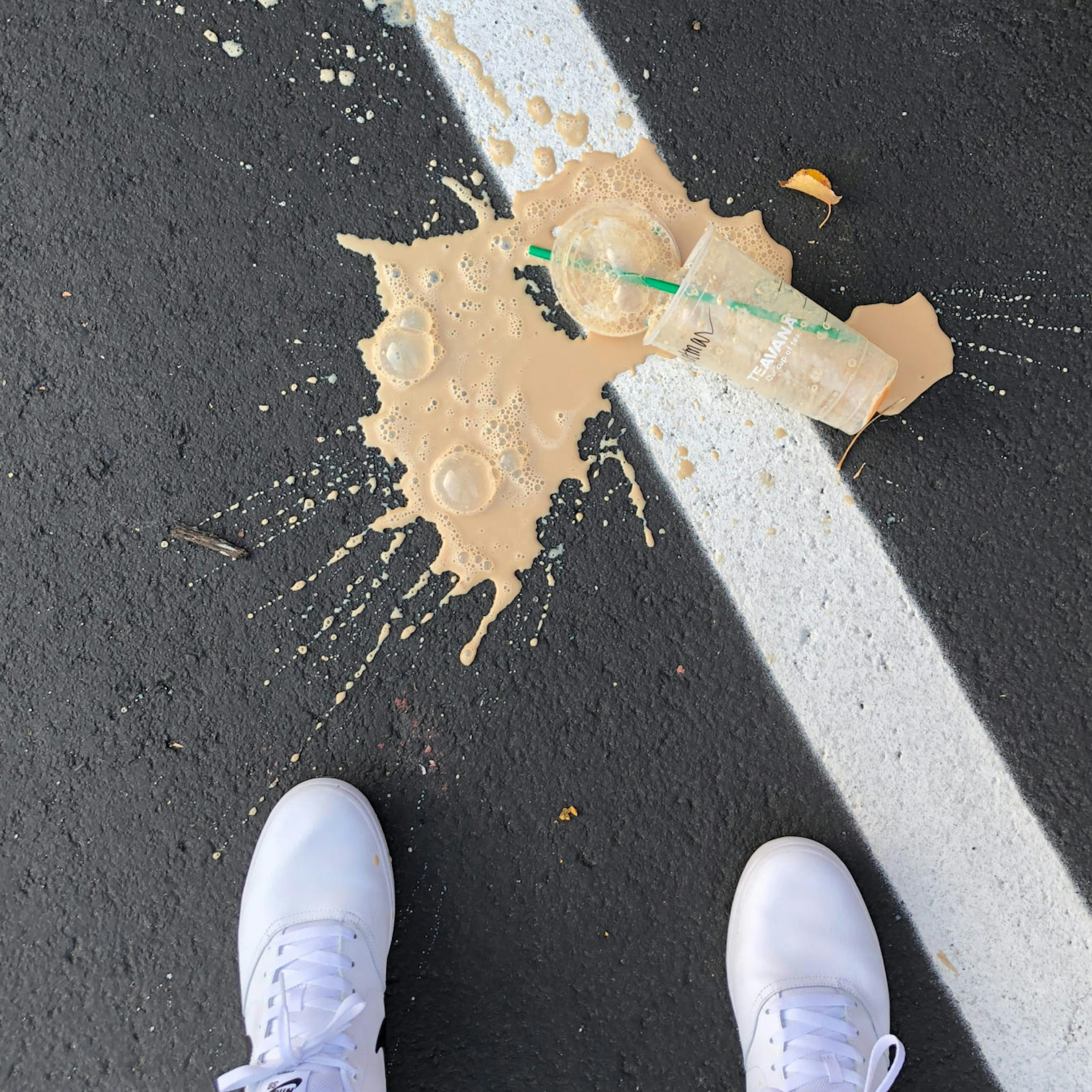 A Starbucks employee drops a coffee drink in surprise after hearing about unionization efforts at another franchise.