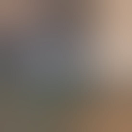 A laptop open to Spotify home page.
